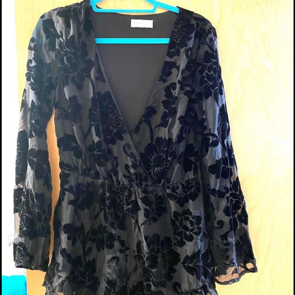 Brand new romper (with shorts) never worn